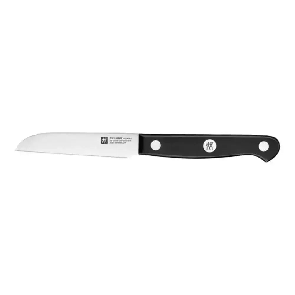 Bread knife with a black handle on a white background