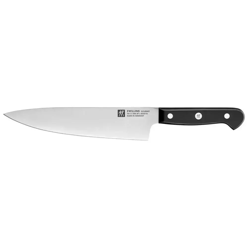 Chef's knife with black handle on a white background