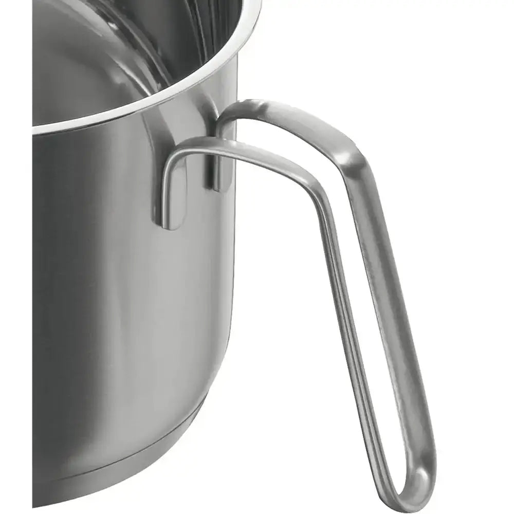 Close-up of a stainless steel milk frothing pitcher with a handle on a white background