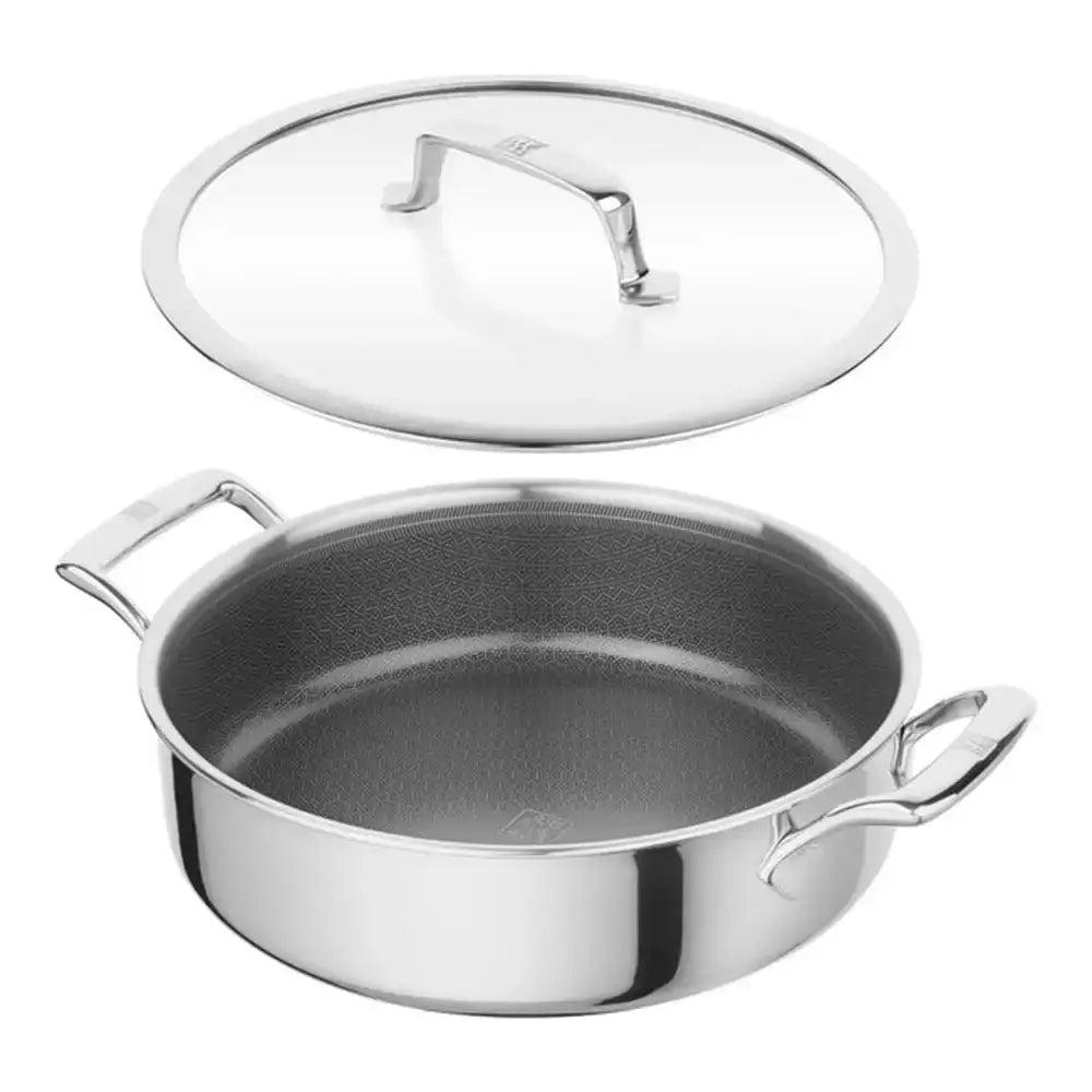 Stainless steel pot with lid on a white background