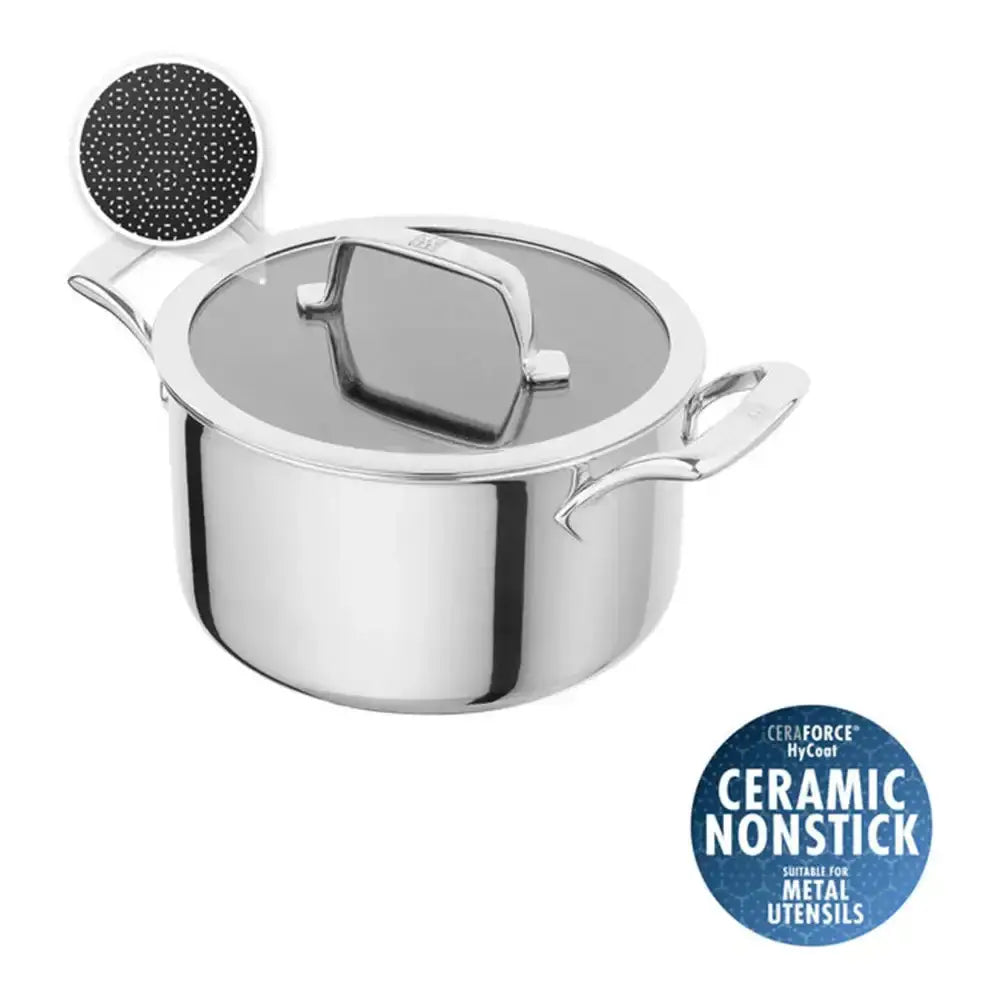 Stainless steel pot with lid and ceramic nonstick coating label on a white background