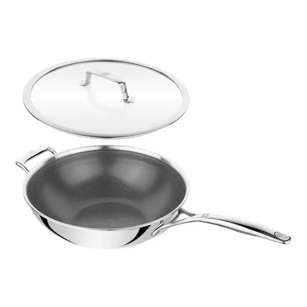 Stainless steel frying pan with lid on a white background