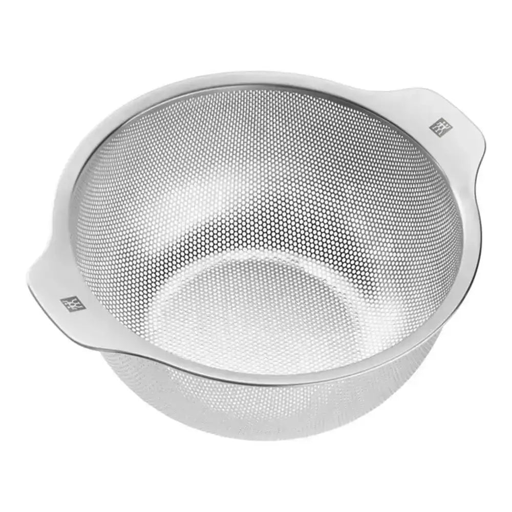 Metal strainer on a white background