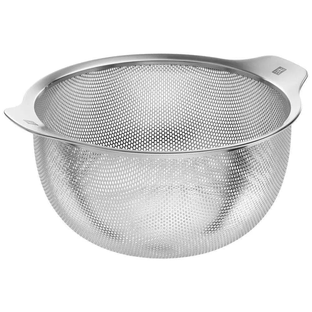 Metal mesh strainer on a white background