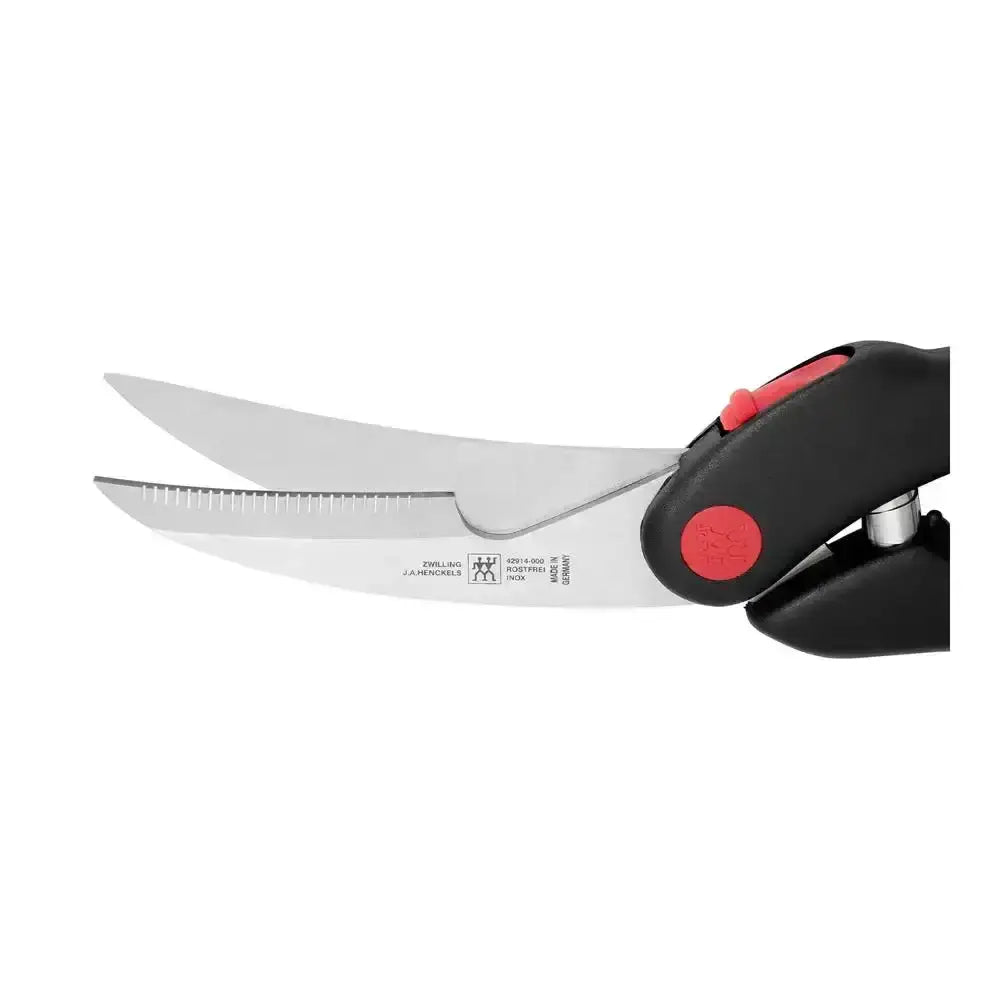 Pair of poultry shears with a black handle and red button on a white background