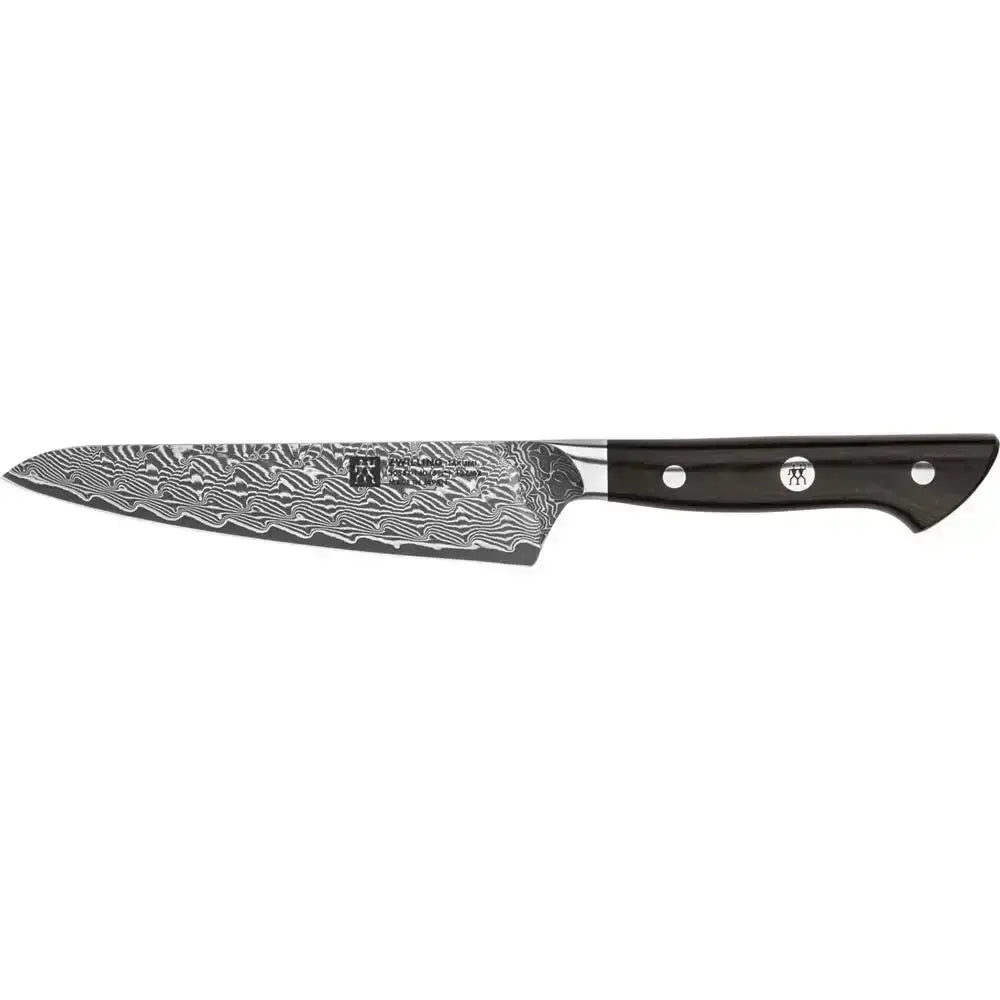 Damascus patterned knife with black handle on a white background